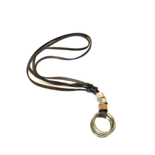 dark brown leather cord necklace with two hanging tribal rings and 3 different metal beads on top consisting of the colors: copper, light silver, and light gold
