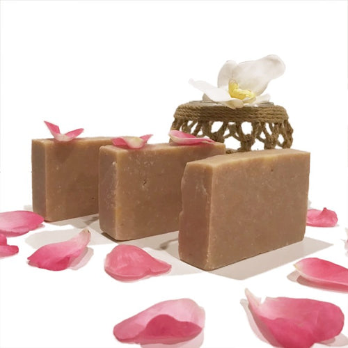 3 Rose Sands soap bars in a row surrounded by rose petals.