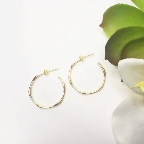 Large thin hoop earrings with beveled edges