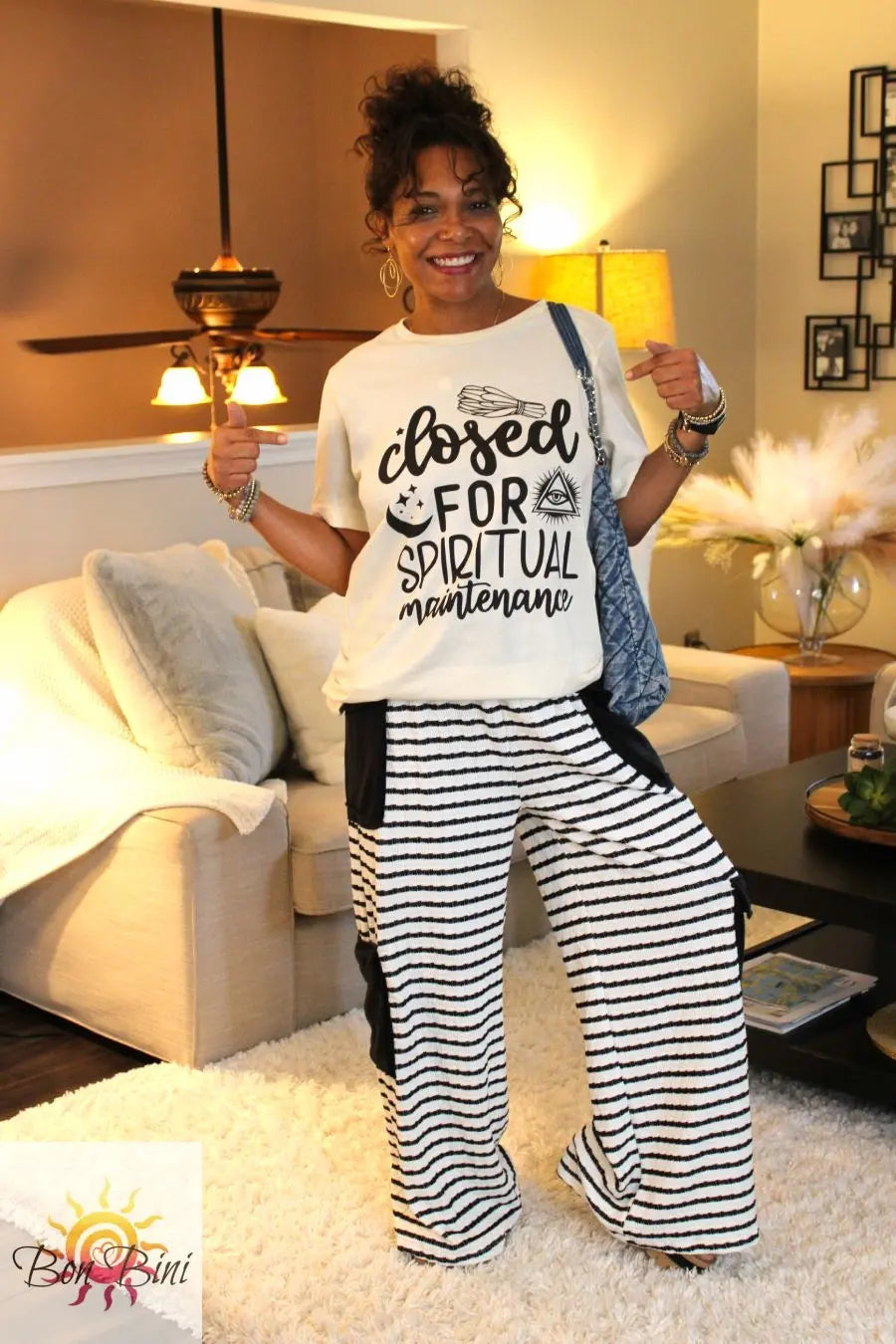 Summer Muse Blouse Top featuring vibrant embroidery, bead detail, & tassels.