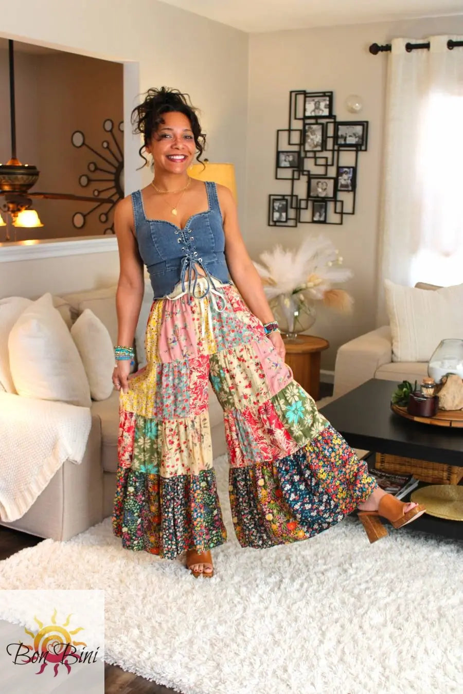 Black Sweater Pants with adjustable waist drawstring, wide-legged fit, & smooth fuzzy texture.