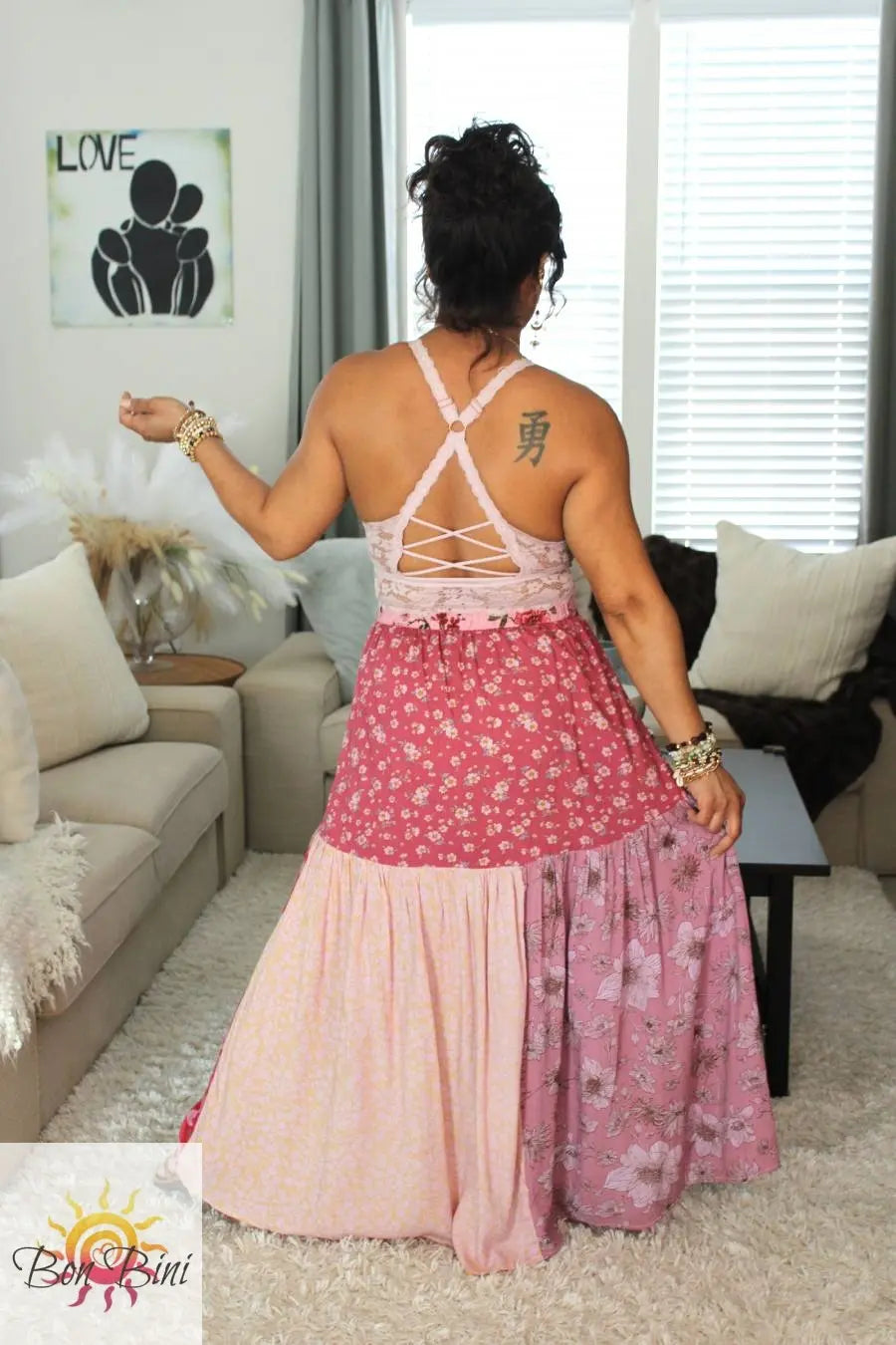 Model Showing Back View Of Mauve Lava Wrap Skirt