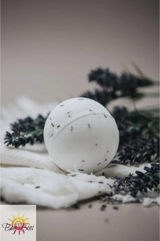 White bath bomb with black lavender flowers.
