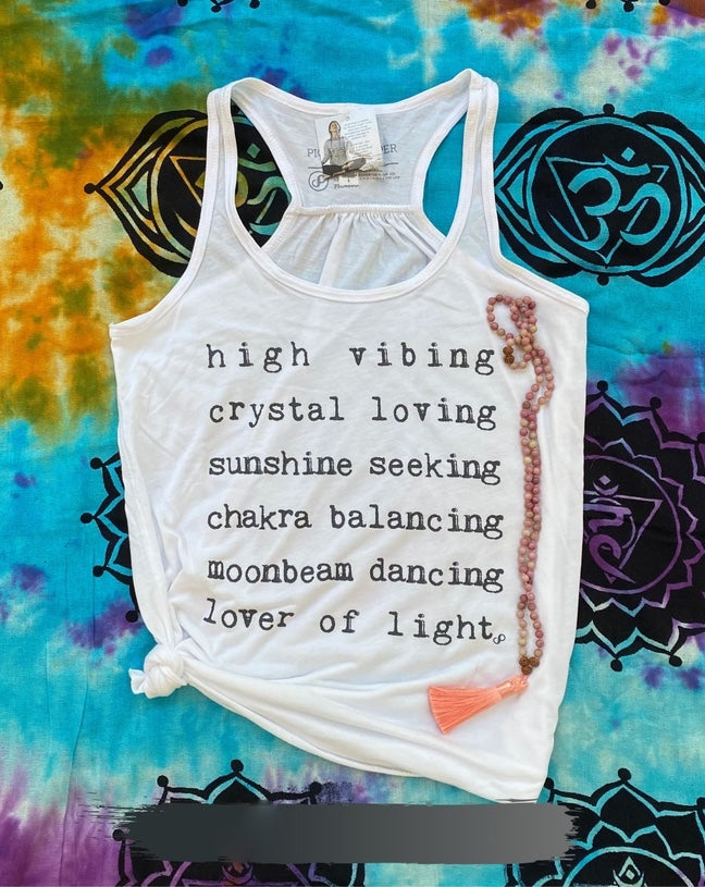White racerback, gathered back tank top that features text as mentioned in description.