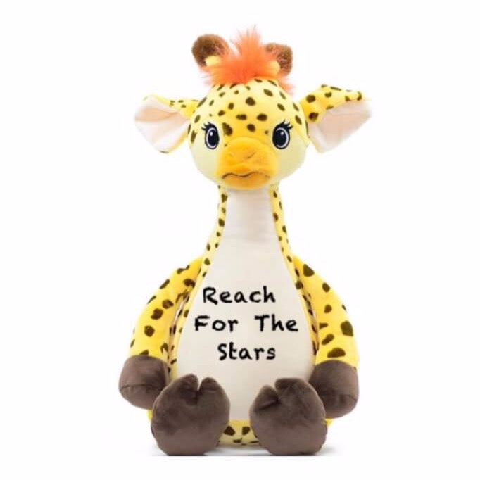 Giraffe sitting upright with orange hair tuft, eyelashed eyes, and "Reach For The Stars" in black text