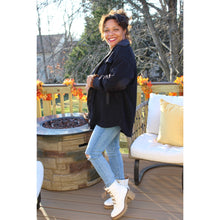 Load image into Gallery viewer, Side view of black fleece shacket layered with spice girl sweatshirt and light wash distressed jeans

