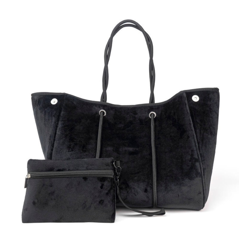 Black velvet tote bag completely expanded and matching wristlet.