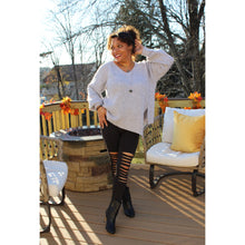 Load image into Gallery viewer, Front view of knee cut out black leggings with lavender grey sweater tunic 
