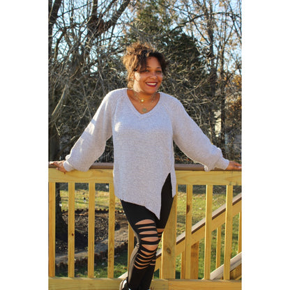 Front view of Lavender Gray sweater tunic with left side seam slit and black knee cut out leggings