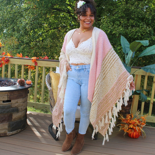 Side view showing tassels on hem on kimono.