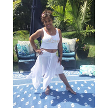 Load image into Gallery viewer, 5&#39;1 Model Wearing White Halter Style Convertible Top/Skirt as Skirt With White &quot;Love&quot; Tight Fitting Cropped Tank
